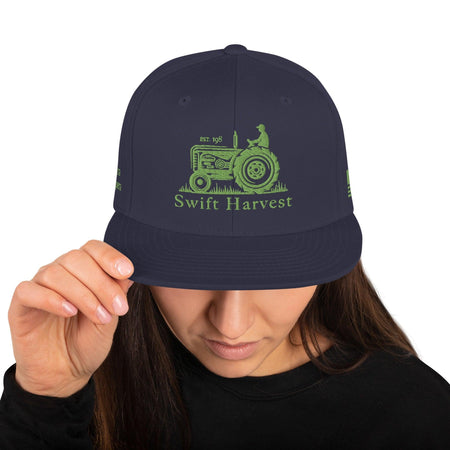 swiftharvest.net Navy Swift Harvest Tractor Snapback Hat
